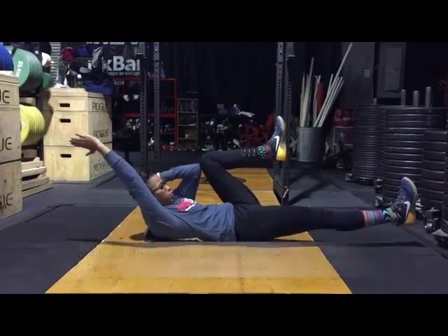 Ipsilateral Dead Bug Drill with Isometric Knee to Elbow Hold